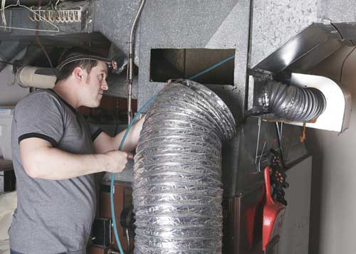 Furnace and duct cleaning technician
